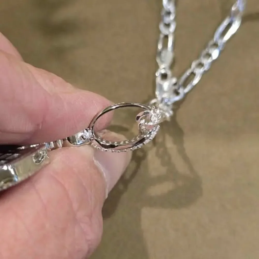 Moissanite Cross on 20